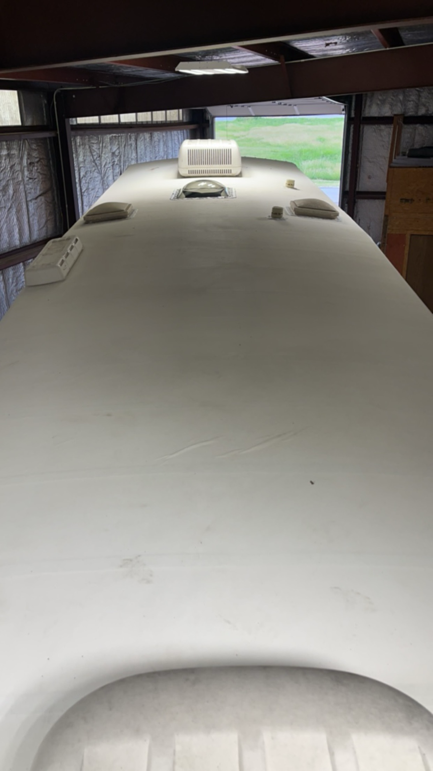Restored and sealed white RV roof